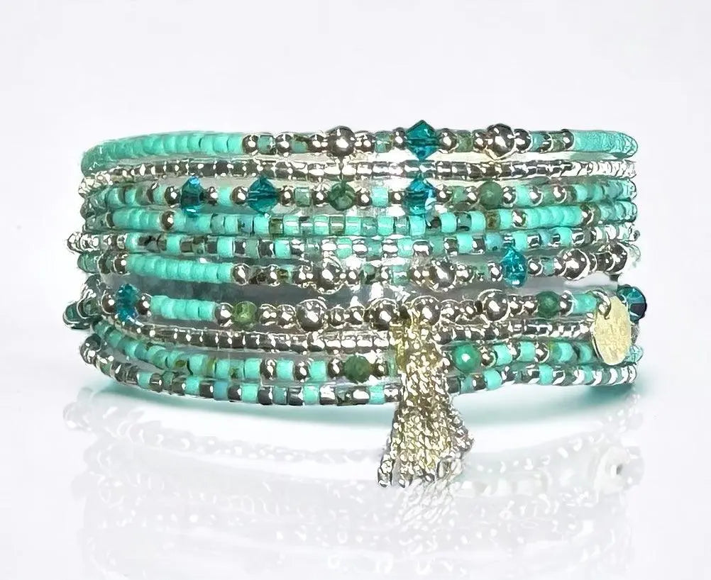 Manchette Multi rangs turquoise et argent " Poupoupidou III "