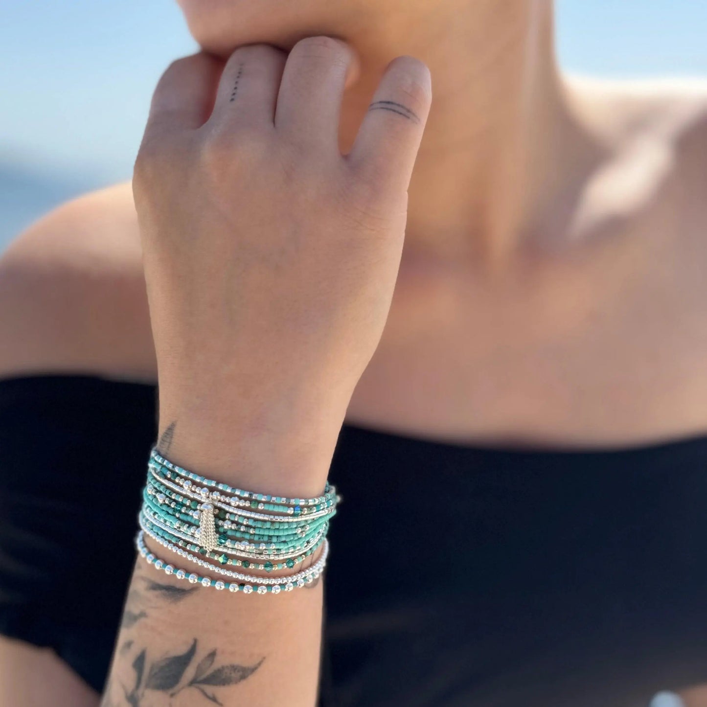Manchette Multi rangs turquoise et argent " Poupoupidou III "